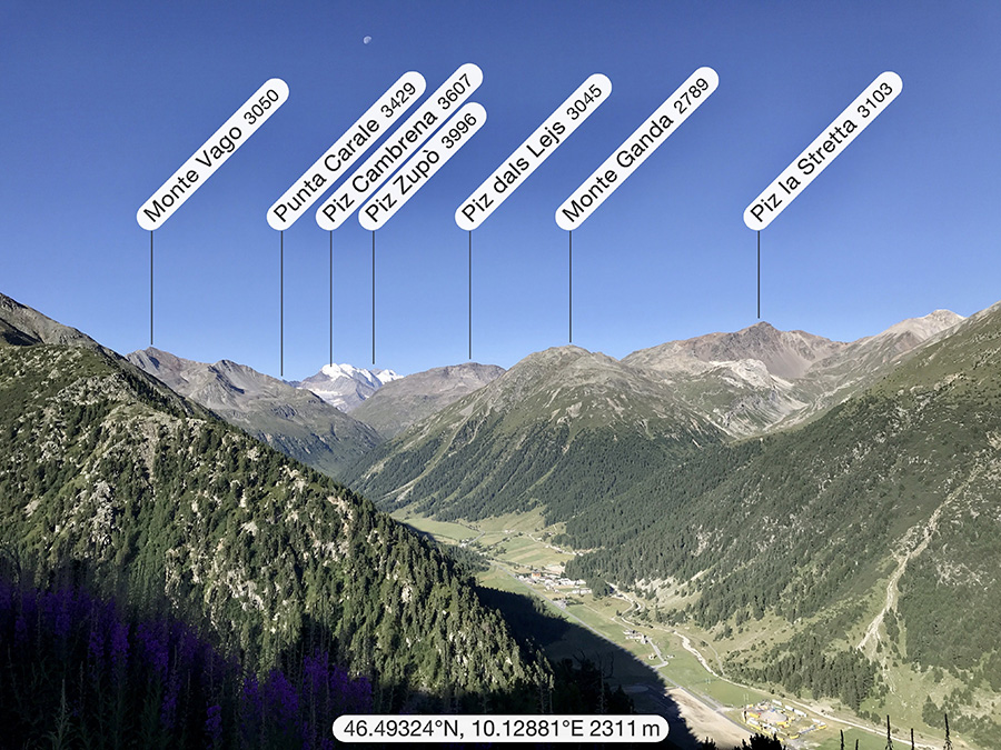 Baitel dal Moton da l'Al e veduta verso la valle di Livigno a Campaciol e le vette del Gruppo del Bernina